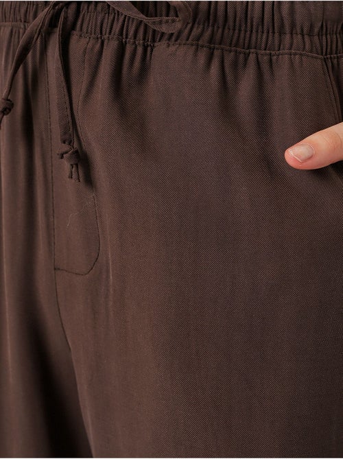 Pantaloni a gamba larga a vita alta con tasca bdart - Kiabi Pantaloni a gamba larga a vita alta con tasca bdart - Kiabi