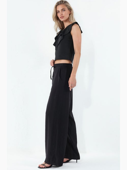 Pantaloni a gamba larga a vita alta con tasca bdart - Kiabi Pantaloni a gamba larga a vita alta con tasca bdart - Kiabi