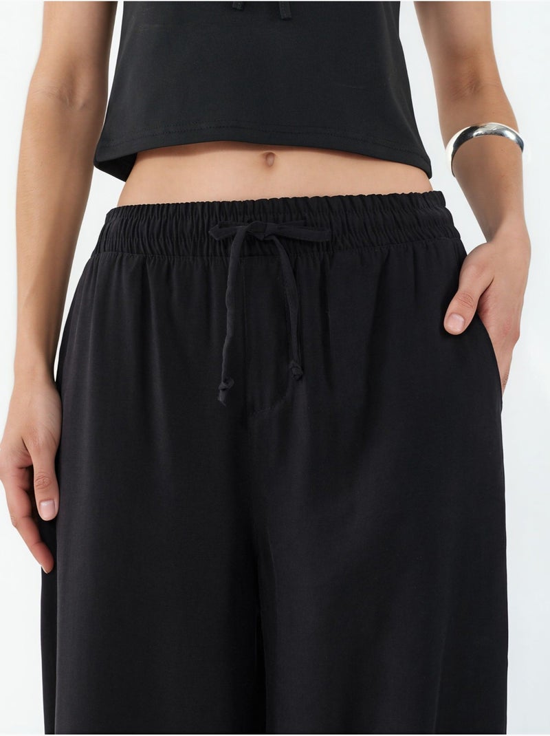 Pantaloni a gamba larga a vita alta con tasca bdart Nero - Kiabi
