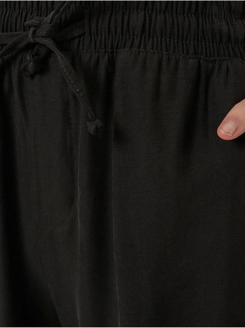 Pantaloni a gamba larga a vita alta con tasca bdart - Kiabi Pantaloni a gamba larga a vita alta con tasca bdart - Kiabi