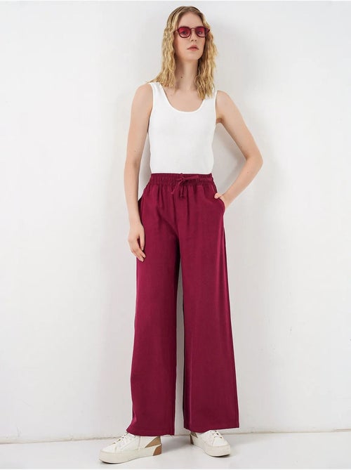 Pantaloni a gamba larga a vita alta con tasca bdart - Kiabi Pantaloni a gamba larga a vita alta con tasca bdart - Kiabi