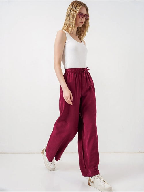 Pantaloni a gamba larga a vita alta con tasca bdart - Kiabi Pantaloni a gamba larga a vita alta con tasca bdart - Kiabi