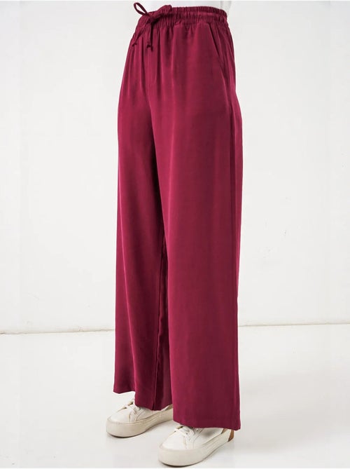 Pantaloni a gamba larga a vita alta con tasca bdart - Kiabi Pantaloni a gamba larga a vita alta con tasca bdart - Kiabi