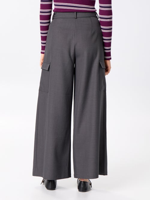 Pantaloni a gamba larga a vita alta con tasche a patta - Kiabi Pantaloni a gamba larga a vita alta con tasche a patta - Kiabi