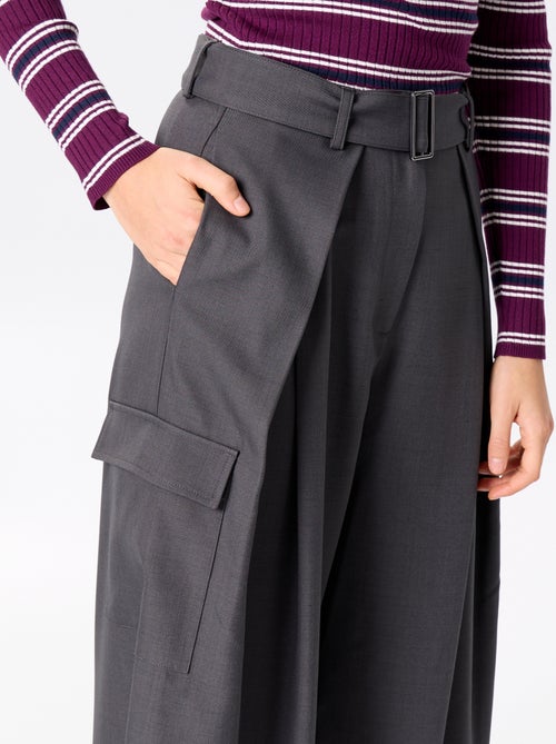 Pantaloni a gamba larga a vita alta con tasche a patta - Kiabi Pantaloni a gamba larga a vita alta con tasche a patta - Kiabi