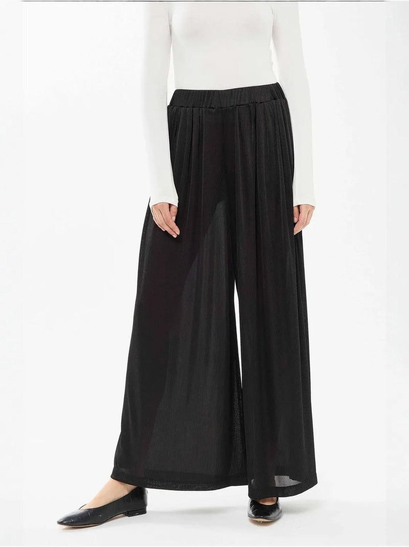 Pantaloni a gamba larga con elastico in vita Nero - Kiabi