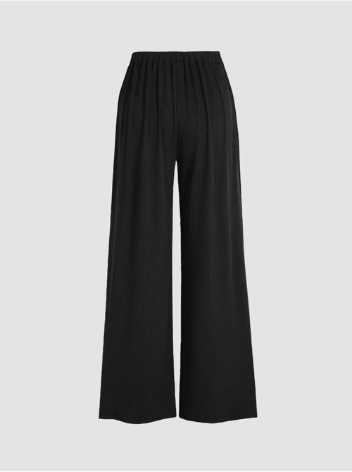 Pantaloni a gamba larga con elastico in vita - Kiabi Pantaloni a gamba larga con elastico in vita - Kiabi