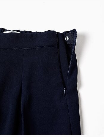 Pantaloni a gamba larga con pieghe frontali
