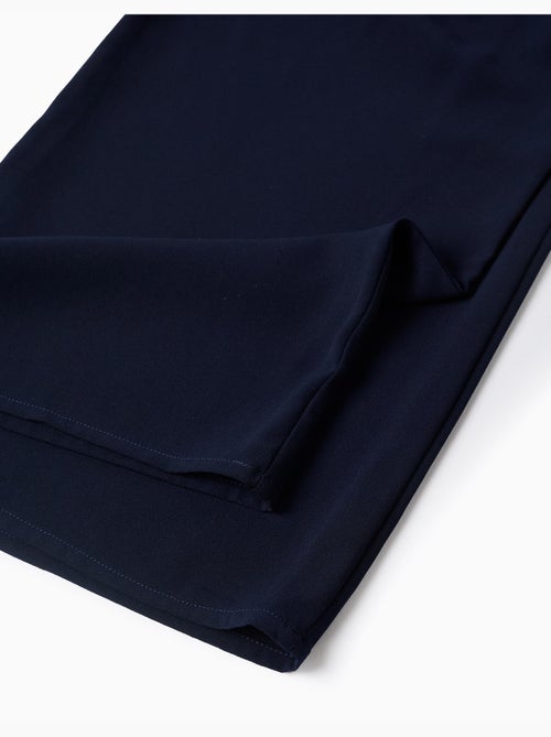 Pantaloni a gamba larga con pieghe frontali - Kiabi