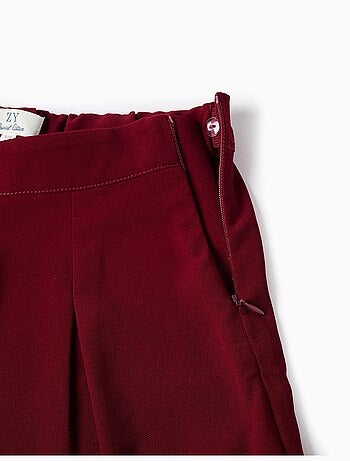 Pantaloni a gamba larga con pieghe frontali