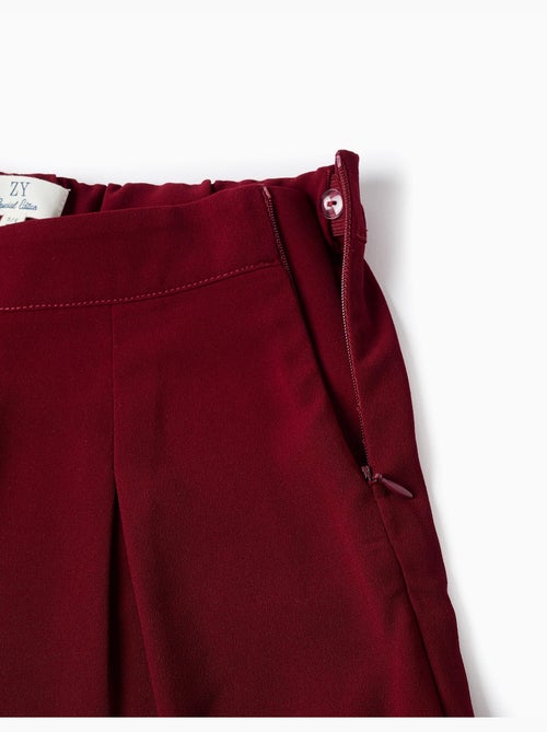 Pantaloni a gamba larga con pieghe frontali - Kiabi