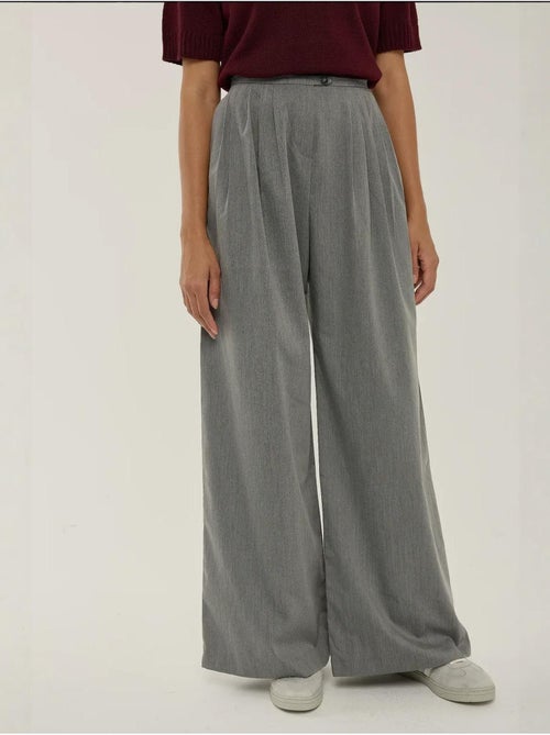 Pantaloni a gamba larga con pieghe hiccup - Kiabi Pantaloni a gamba larga con pieghe hiccup - Kiabi