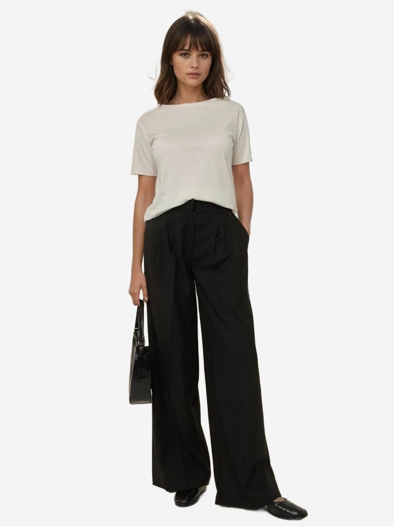 Pantaloni a gamba larga con pieghe hiccup Nero - Kiabi