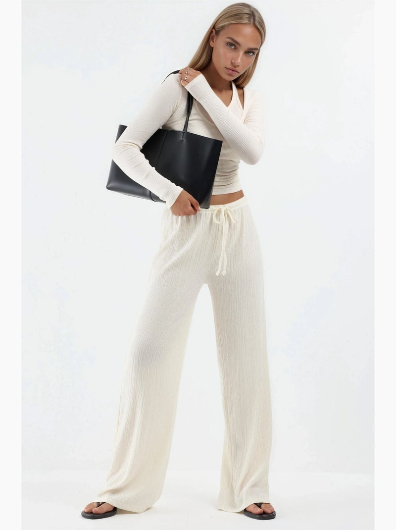 Pantaloni a gamba larga con vita con coulisse busem Crema - Kiabi