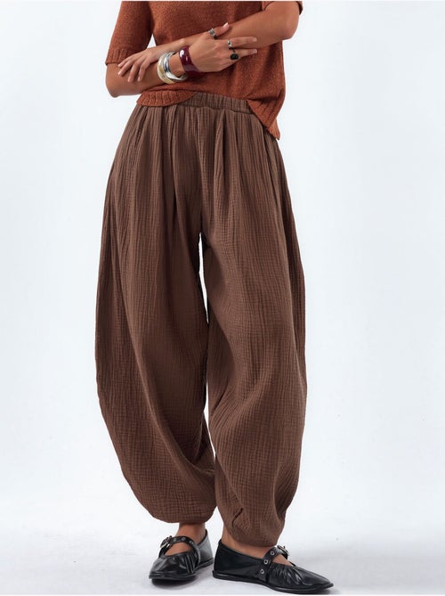 Pantaloni a gamba larga con vita elastica busem - Kiabi Pantaloni a gamba larga con vita elastica busem - Kiabi