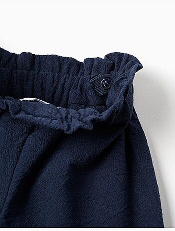 Pantaloni a gamba larga in cotone con fiori ricamati
