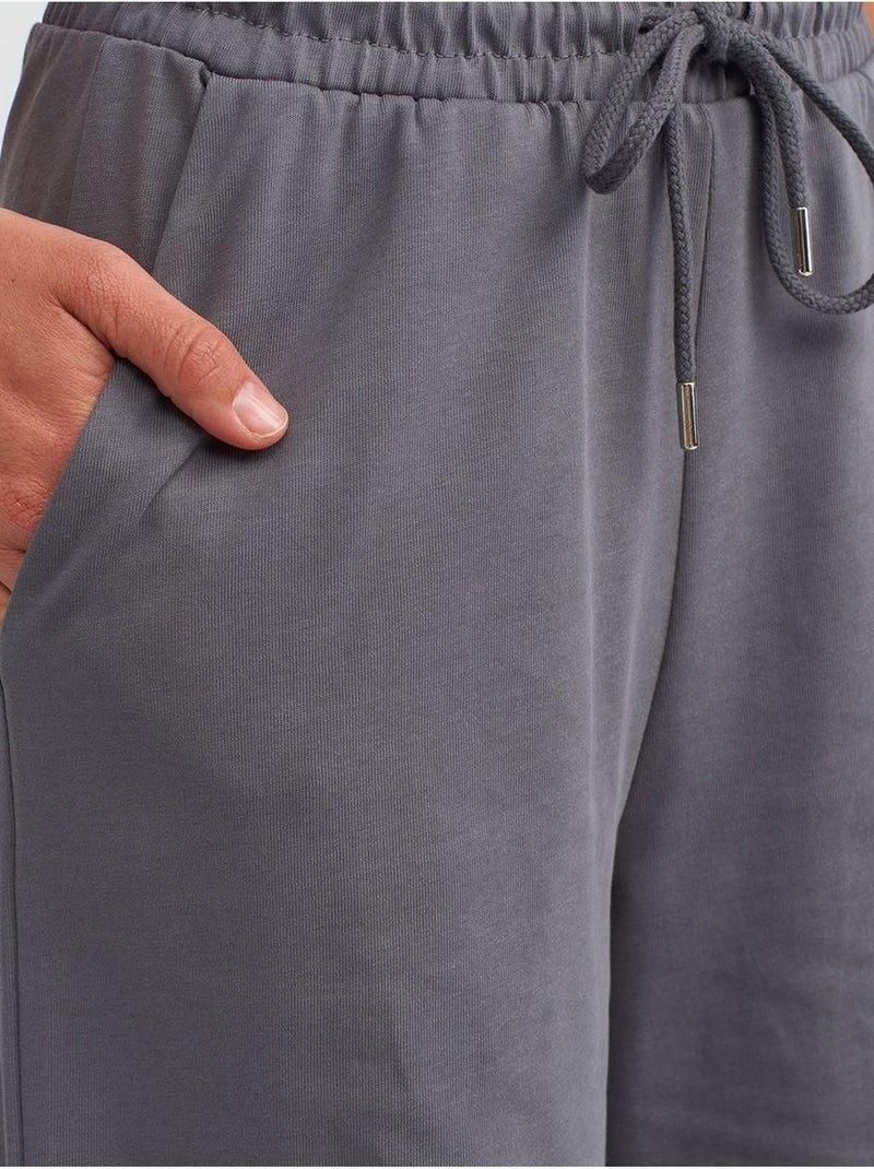 Pantaloni a gamba larga in cotone testurizzato dilvin Grigio nero - Kiabi