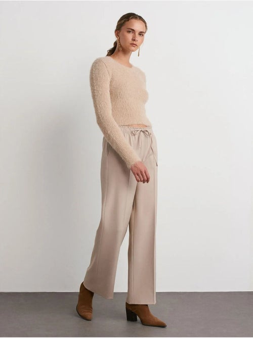 Pantaloni a gamba larga in crêpe dilvin - Kiabi Pantaloni a gamba larga in crêpe dilvin - Kiabi