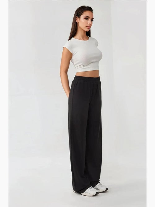 Pantaloni a gamba larga in maglia con elastico in vita hiccup - Kiabi Pantaloni a gamba larga in maglia con elastico in vita hiccup - Kiabi