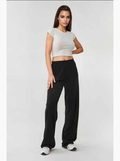 Pantaloni a gamba larga in maglia con elastico in vita hiccup - Kiabi Pantaloni a gamba larga in maglia con elastico in vita hiccup - Kiabi