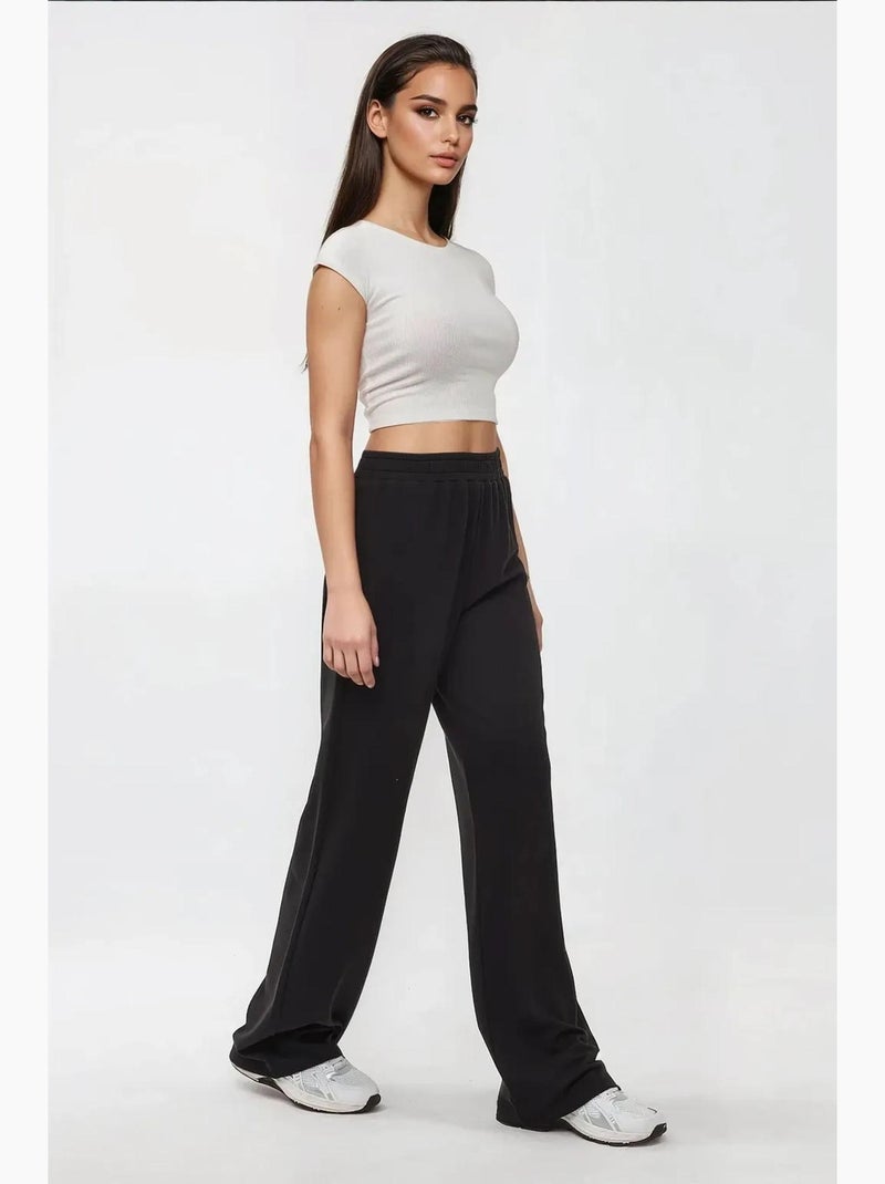 Pantaloni a gamba larga in maglia con elastico in vita hiccup Nero - Kiabi