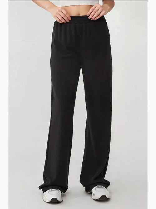 Pantaloni a gamba larga in maglia con elastico in vita hiccup - Kiabi Pantaloni a gamba larga in maglia con elastico in vita hiccup - Kiabi