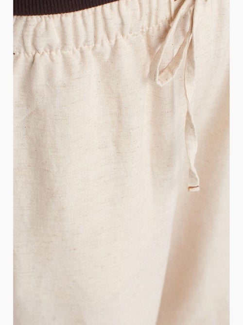 Pantaloni a gamba larga in misto lino dilvin - Kiabi Pantaloni a gamba larga in misto lino dilvin - Kiabi