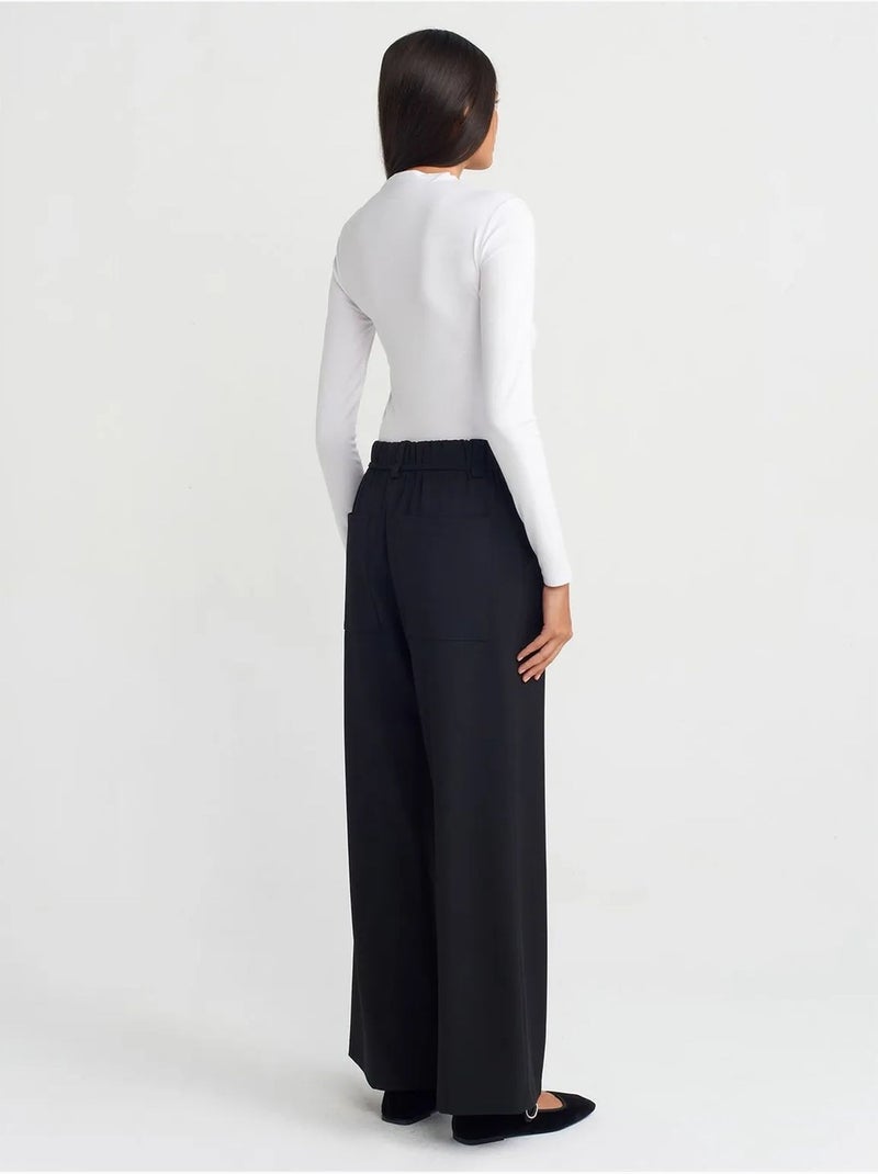 Pantaloni a gamba larga in tessuto con vita elasticizzata e coulisse Nero - Kiabi
