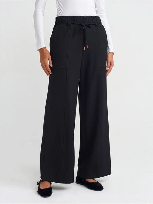 Pantaloni a gamba larga in tessuto con vita elasticizzata e coulisse - Kiabi Pantaloni a gamba larga in tessuto con vita elasticizzata e coulisse - Kiabi