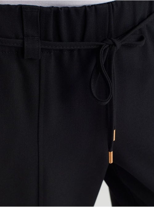 Pantaloni a gamba larga in tessuto con vita elasticizzata e coulisse - Kiabi Pantaloni a gamba larga in tessuto con vita elasticizzata e coulisse - Kiabi