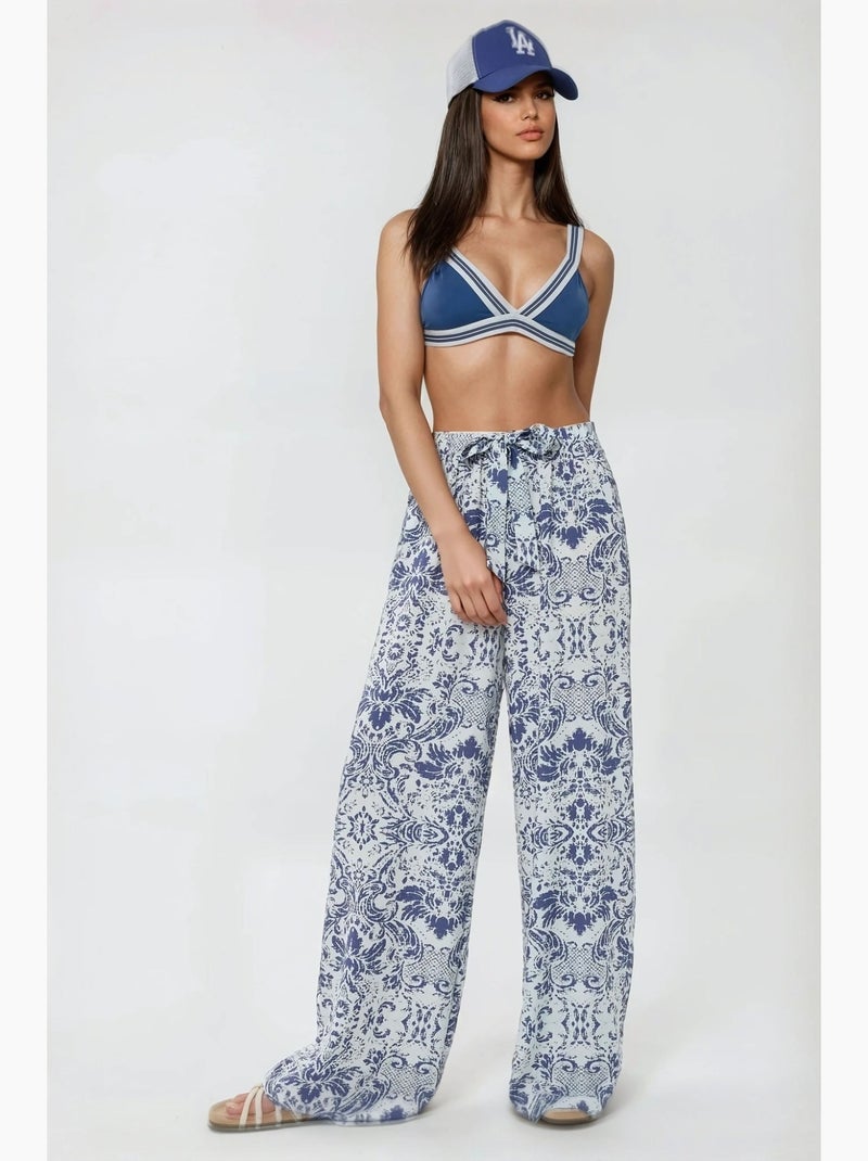 Pantaloni a gamba larga stampati con coulisse hiccup Bianco - Kiabi