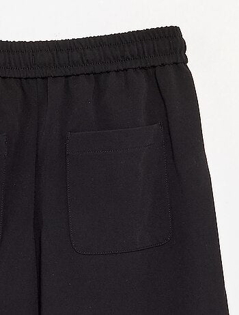 Pantaloni a gamba larga / taglio ampio