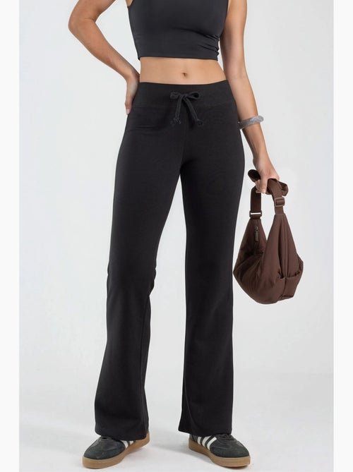 Pantaloni a gamba svasata con vita elastica busem - Kiabi Pantaloni a gamba svasata con vita elastica busem - Kiabi