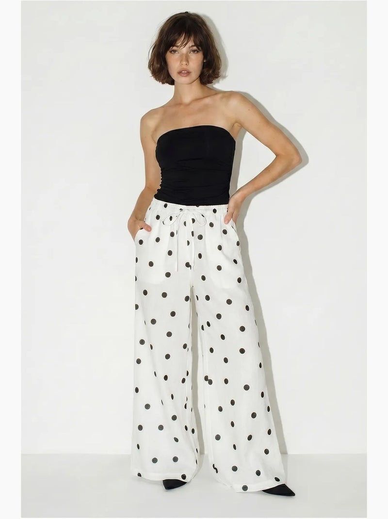 Pantaloni a pois a gamba ampia con cintura da annodare in vita lucci Bianco sporco - Kiabi