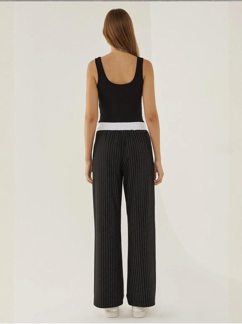 Pantaloni a righe con elastico in vita Nero - Kiabi