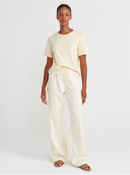 Pantaloni a vita alta a gamba ampia con cintura da annodare dilvin - Kiabi Pantaloni a vita alta a gamba ampia con cintura da annodare dilvin - Kiabi