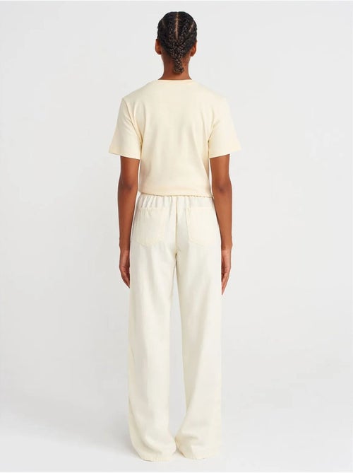 Pantaloni a vita alta a gamba ampia con cintura da annodare dilvin - Kiabi Pantaloni a vita alta a gamba ampia con cintura da annodare dilvin - Kiabi