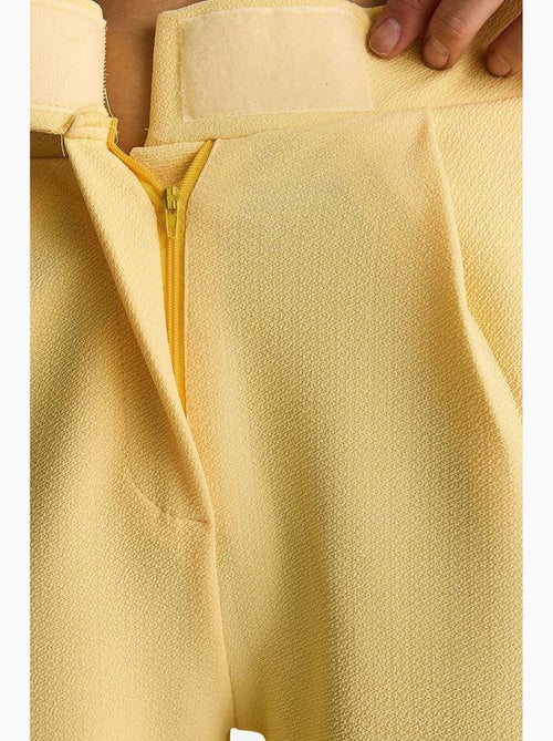 Pantaloni a vita alta a gamba ampia con pieghe lucci - Kiabi Pantaloni a vita alta a gamba ampia con pieghe lucci - Kiabi