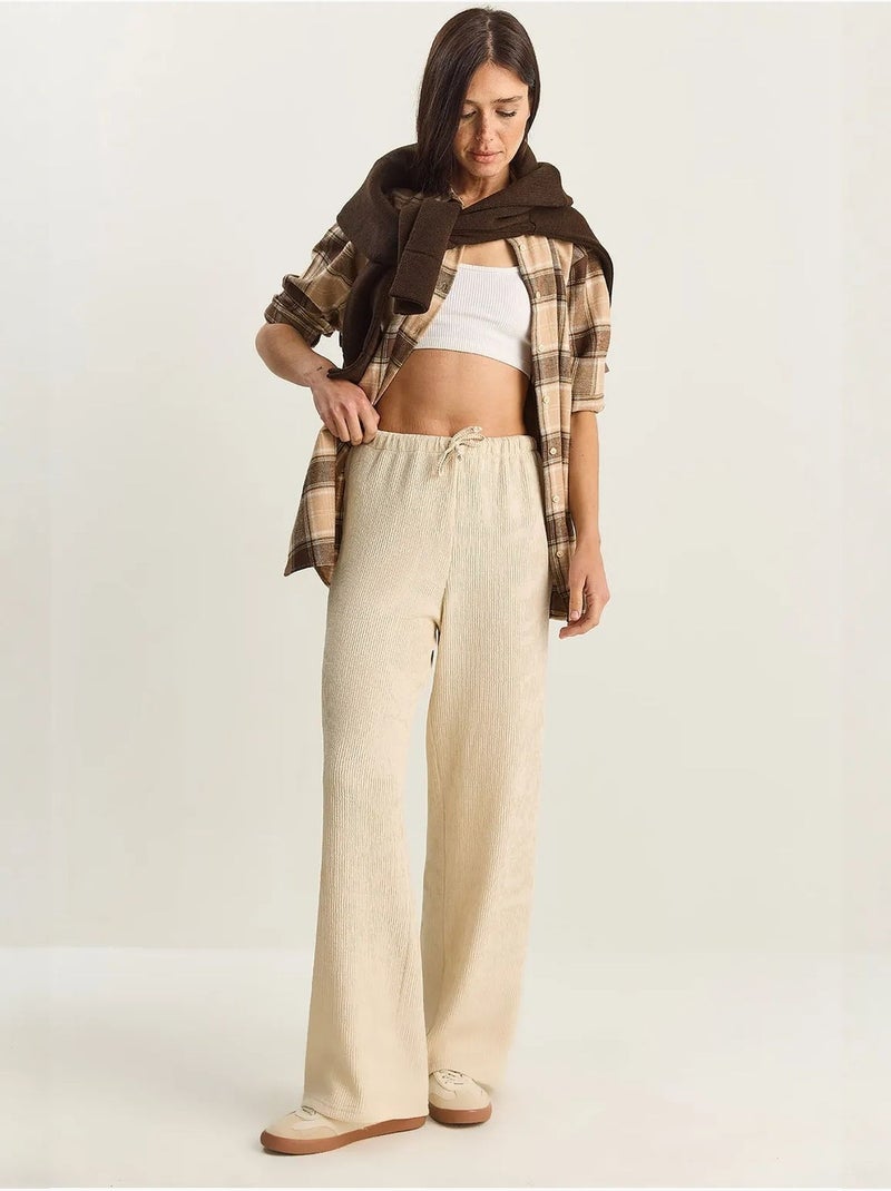 Pantaloni a vita alta a gamba ampia lucci Crema - Kiabi