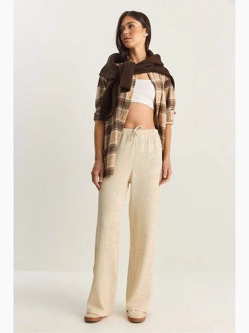 Pantaloni a vita alta a gamba ampia lucci - Kiabi Pantaloni a vita alta a gamba ampia lucci - Kiabi