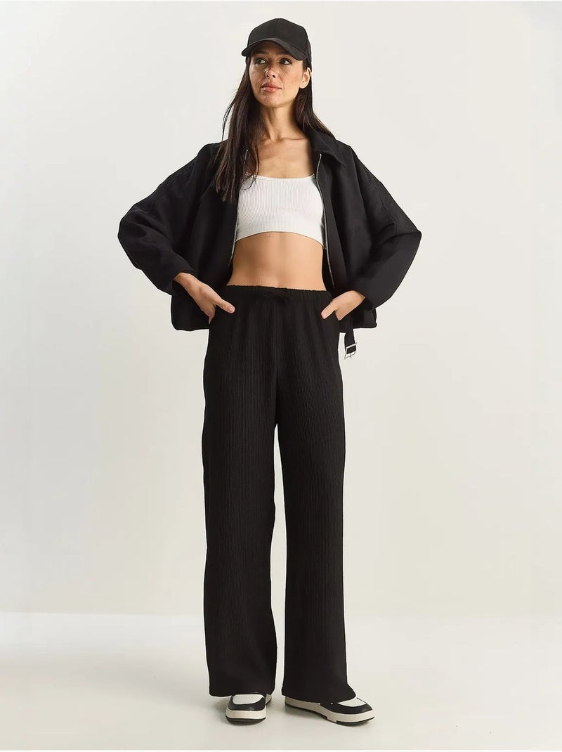 Pantaloni a vita alta a gamba ampia lucci Nero - Kiabi