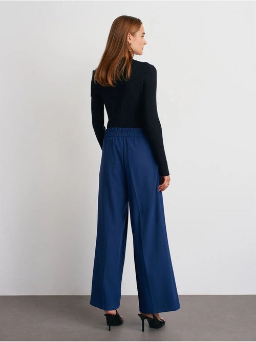 Pantaloni a vita alta a gamba larga con pieghe dilvin - Kiabi Pantaloni a vita alta a gamba larga con pieghe dilvin - Kiabi