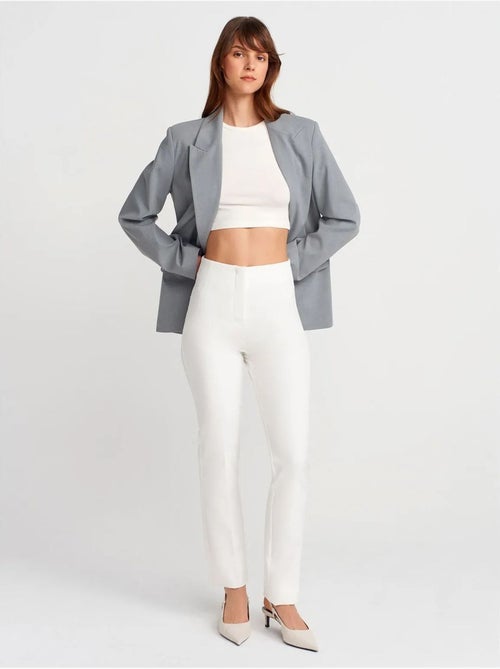 Pantaloni a vita alta a zampa con pieghe - Kiabi Pantaloni a vita alta a zampa con pieghe - Kiabi