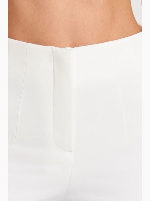 Pantaloni a vita alta a zampa con pieghe dilvin - Kiabi Pantaloni a vita alta a zampa con pieghe dilvin - Kiabi
