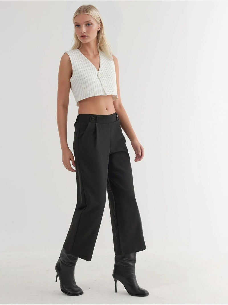 Pantaloni a vita alta con dettaglio bottoni Nero - Kiabi