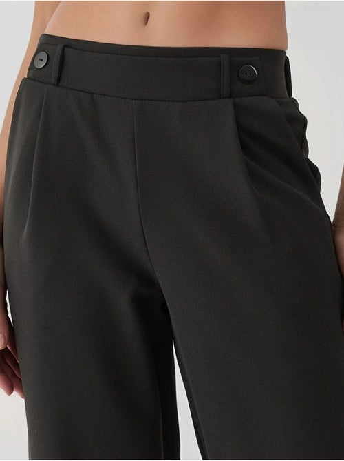 Pantaloni a vita alta con dettaglio bottoni - Kiabi Pantaloni a vita alta con dettaglio bottoni - Kiabi