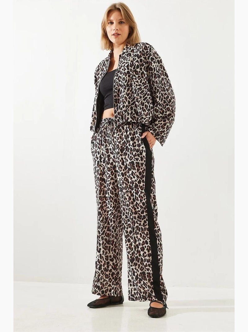 Pantaloni a vita alta con stampa leopardata a gamba ampia lucci Beige naturale - Kiabi