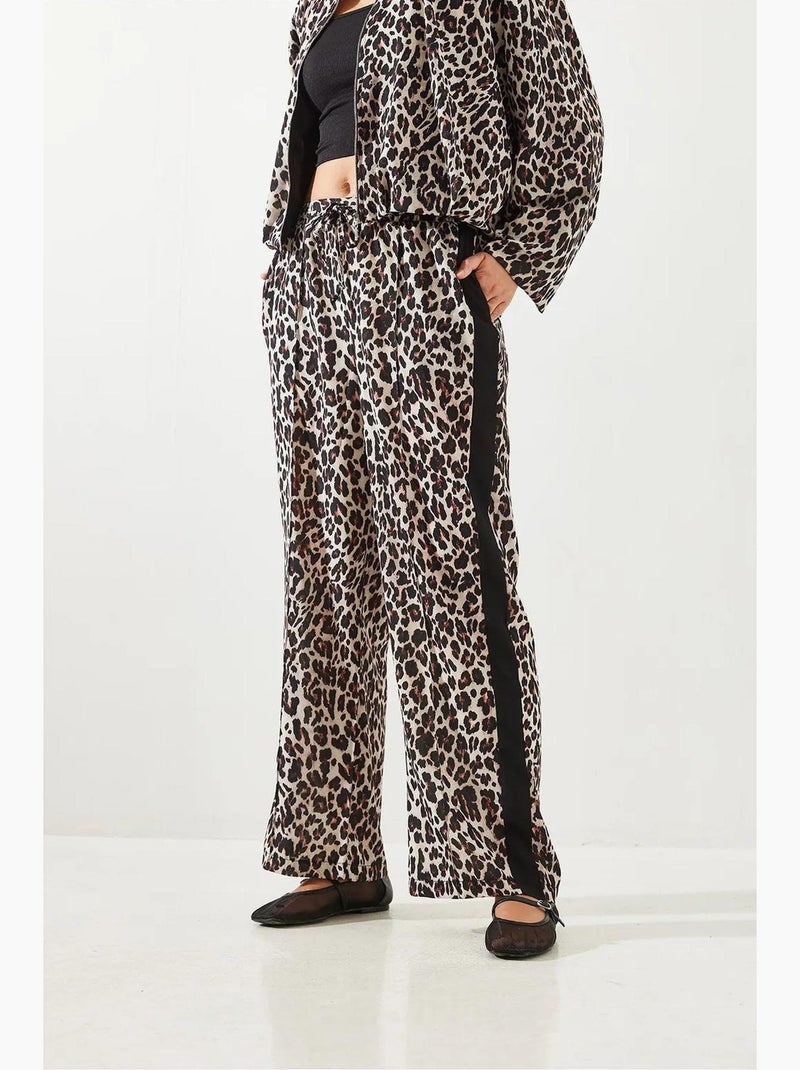 Pantaloni a vita alta con stampa leopardata a gamba ampia lucci Beige naturale - Kiabi