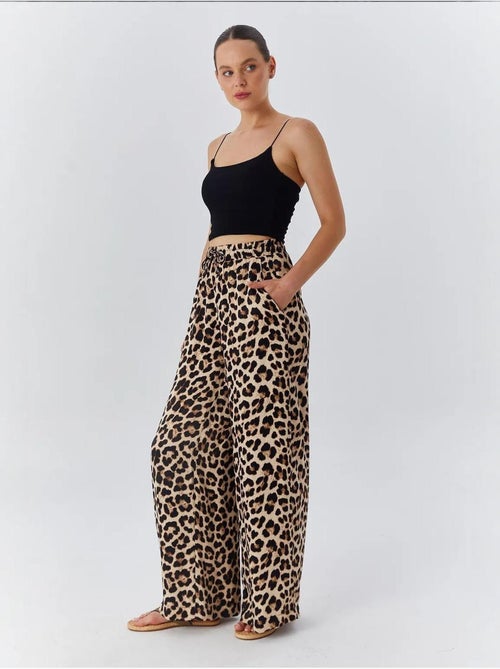 Pantaloni a vita alta con stampa leopardata e gamba ampia mixray - Kiabi Pantaloni a vita alta con stampa leopardata e gamba ampia mixray - Kiabi