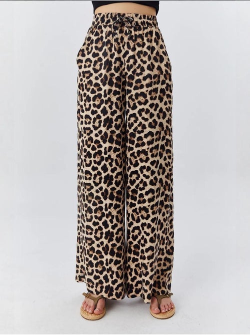 Pantaloni a vita alta con stampa leopardata e gamba ampia mixray - Kiabi Pantaloni a vita alta con stampa leopardata e gamba ampia mixray - Kiabi